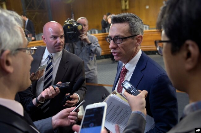 Clint Watts, a Senior Fellow at the Foreign Policy Research Institute Program on National Security, talks with reporters on Capitol Hill in Washington, March 30, 2017, following his testimony before the Senate Intelligence Committee hearing on Russian intelligence activities.