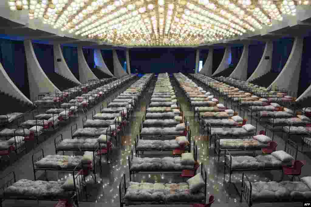 Beds are lined up in the hall of a temporary hospital during a partial lockdown amid the COVID-19 outbreak caused by the novel coronavirus, in the Karen Demirchyan&#39;s Sports and Concert Complex, in Yerevan, Armenia.