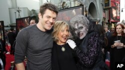 Producer Jason Blum, Lin Shaye and The Black Bride seen at Gramercy Pictures presents the world premiere of "Insidious: Chapter 3" held at TCL Chinese Theatre on Thursday, June 4, 2015, in Hollywood. (Photo by Eric Charbonneau/Invision for Focus Features/AP Images)