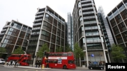 FILE - Luxury apartment complex One Hyde Park is seen London, May 2, 2014. Anti-corruption campaigners see it as a landmark to what they see as Britain’s hypocritical role in offshore finance.