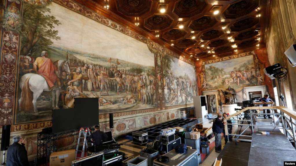 Workers prepare the Orazi and Curiazi hall for the meeting of EU leaders on the 60th anniversary of the Treaty of Rome, in Rome, Italy, March 24, 2017.
