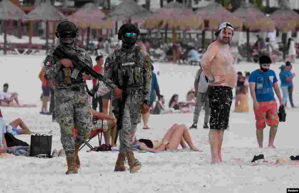 Members of the National Guard patrol a beach resort as part of the vacation security in the tourist zone in Cancun by the government of Quintana Roo, Mexico, Dec. 5, 2021.