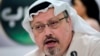 FILE - Saudi journalist Jamal Khashoggi speaks during a press conference in Manama, Bahrain, Feb. 1, 2015. A pro-government Turkish newspaper Wednesday published a gruesome recounting of the alleged slaying of Khashoggi at the Saudi Consulate in Istanbul