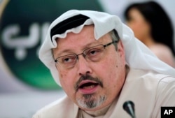 FILE - Saudi journalist Jamal Khashoggi speaks during a press conference in Manama, Bahrain, Feb. 1, 2015. A pro-government Turkish newspaper Wednesday published a gruesome recounting of the alleged slaying of Khashoggi at the Saudi Consulate in Istanbul