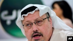 FILE - Saudi journalist Jamal Khashoggi speaks during a press conference in Manama, Bahrain, Feb. 1, 2015. A pro-government Turkish newspaper Wednesday published a gruesome recounting of the alleged slaying of Khashoggi at the Saudi Consulate in Istanbul