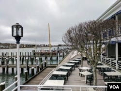 Tyler Hayes, vice president of Cape Cod Restaurants, says his seasonal businesses — including Flying Bride Restaurant, shown here in April — would suffer without H-2B workers. After 20 years in the business, he says the children of foreign workers have begun to work for them. (R. Taylor/VOA)