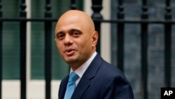 FILE - Government Cabinet Minister Sajid Javid arrives for a meeting at 10 Downing Street in London,Oct. 10, 2017.