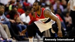 John Wall des Washington Wizards lors d'un match contre les Raptors de Toronto, le 26 Avril 2015 à Washington. (AP Photo/Alex Brandon)