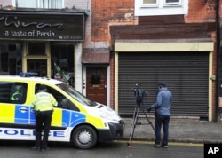 A property in Birmingham, England, was searched by police following Wednesday's London attack, March 23, 2017.