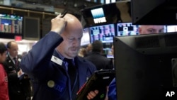 A trader on the floor of the New York Stock Exchange, Feb. 8, 2016.