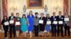 Jennifer Yan, fourth from right, is among the recipients of this year Secretary of State Award for Outstanding Volunteerism Abroad (SOSA) for her volunteering work in Cambodia. 
