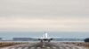 A plane is taking off at Reagan Washington National Airport outside Washington, D.C. (Photo by Diaa Bekheet)