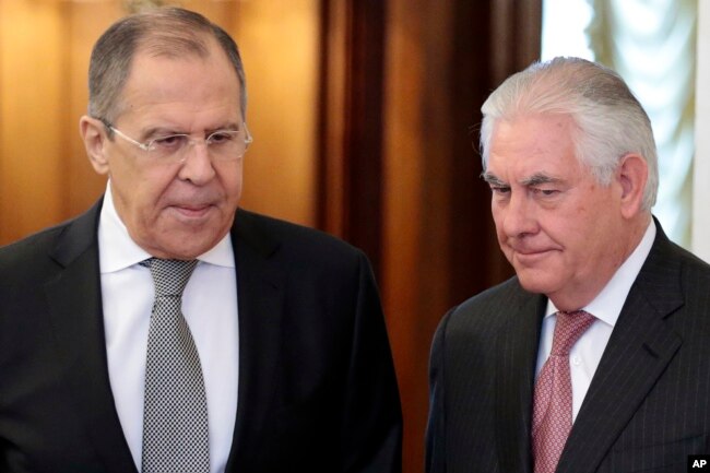 U.S. Secretary of State Rex Tillerson and Russian Foreign Minister Sergei Lavrov enter a hall prior to their talks in Moscow, April 12, 2017.