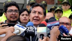 Colombia's Attorney General Nestor Humberto Martinez addresses the media, after the bodies of two Ecuadorean journalists and their driver, killed two months ago while being held captive by Colombian insurgents, have been found and identified, in Cali, Col