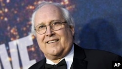 FILE - Chevy Chase attends the SNL 40th Anniversary Special at Rockefeller Plaza in New York.