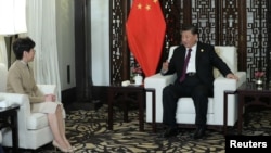 中國國家主席習近平在上海接見香港特首林鄭月娥。 （2019年11月4日）