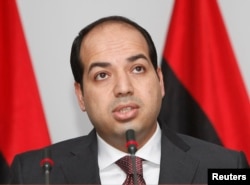 Libya's Supreme Court ruled the election of Prime Minister Ahmed Maiteeq unconstitutional on Monday. Maiteeq is shown at a news conference in Tripoli, Libya, June 7, 2014.