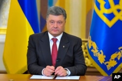Ukrainian President Petro Poroshenko makes a televised address in Kyiv, Ukraine, June 30, 2014.