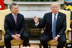 President Donald Trump meets with Argentine President Mauricio Macri in the Oval Office of the White House in Washington, April 27, 2017.