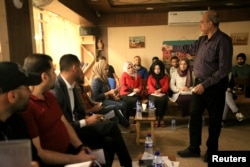 Students of journalism gather at training workshop for Iraqi journalists at Qantara Culture Cafe in Mosul, Oct. 26, 2018.