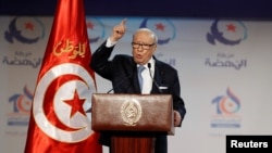 Le président tunisien Beji Caid Essebsi lors d'un discours devant le congrès du mouvement Ennahdha à Tunis, Tunisie, le 20 mai 2016.