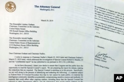 FILE - The letter that Attorney General William Barr sent to Congress on March 29, 2019, is photographed in Washington.