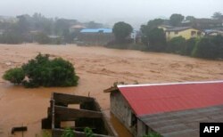 This picture shows flooded streets in Regent near Freetown, Aug. 14, 2017.