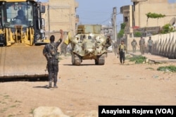 Kurdish forces are seen in Qamishli, April 21, 2016.