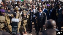 President Paul Biya (C) greets supporters during an electoral meeting at the stadium in Maroua during his visit in the Far North Region of Cameroon, Sept. 29, 2018.