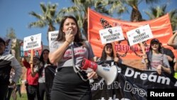 FILE - Melody K., 23, a DACA recipient who was brought to the U.S. when she was 8, speaks during rally in support of a permanent legislative solution for immigrants in Los Angeles, Feb. 3, 2018. 