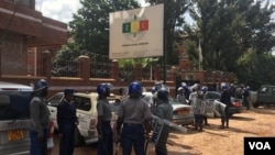 Police sealed Zimbabwe Electoral Commission offices and only allowed a few opposition members to get in March 22, 2017, to present their petition asking ZEC to step down to ensure undisputed polls in 2018. (S. Mhofu/VOA)
