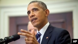 President Barack Obama announces he's rejecting the Keystone XL pipeline because he does not believe it serves the national interest, Nov. 6, 2015, in the Roosevelt Room of the White House in Washington. 