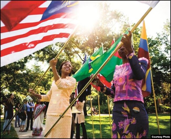 International students wave their national flags at the University of Missouri in Columbia, Missouri.