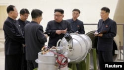 FILE - North Korean leader Kim Jong Un provides guidance on a nuclear weapons program in this undated photo released by North Korea's Korean Central News Agency (KCNA) in Pyongyang, Sept. 3, 2017.