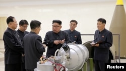 FILE - North Korean leader Kim Jong Un provides guidance on a nuclear weapons program in this undated photo released by North Korea's Korean Central News Agency (KCNA) in Pyongyang, Sept. 3, 2017.