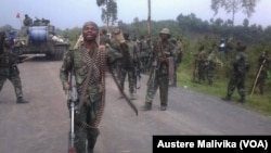 Troupes de la RDC célébrer la victoire sur étamé M23.