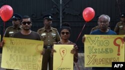 FILE - Maldivian residents living in Sri Lanka take part in a demonstration against the murder of liberal blogger Yameen Rasheed outside the Maldivian High Commission in Colombo, May 8, 2017. 