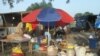 Traders are again selling goods at a market in Bor, June 18, 2014, as the town trickles back to life. Bor was one of the towns hardest hit by fighting in South Sudan.