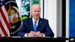 President Joe Biden participates in the White House COVID-19 Response Team's regular call with the National Governors Association, on the White House Campus, Dec. 27, 2021.