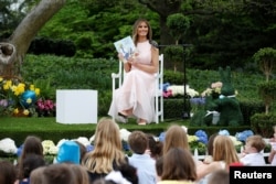 U.S. first lady Melania Trump smiles after reading the children's book "Party Animals" at the 139th annual White House Easter Egg Roll on the South Lawn of the White House in Washington, April 17, 2017.