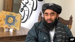 FILE - Taliban government spokesman Zabihullah Mujahid said Monday, June 20, that five British citizens had been released from detention in Afghanistan. Photo taken in Kabul, Afghanistan, Jan. 15, 2022.