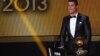 Cristiano Ronaldo reacts after being awarded the FIFA Ballon d'Or 2013 in Zurich January 13, 2014. Portugal and Real Madrid forward Cristiano Ronaldo was named the world's best footballer for the second time on Monday, preventing his great rival Lionel Me