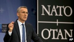 Sekretaris Jenderal NATO Jens Stoltenberg memaparkan laporan tahunan NATO di markas NATO, di Brussels, Kamis, 15 Maret 2018. 