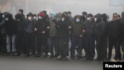 Demonstrators take part in a protest triggered by fuel price increase in Almaty, Kazakhstan, Jan. 5, 2022. 