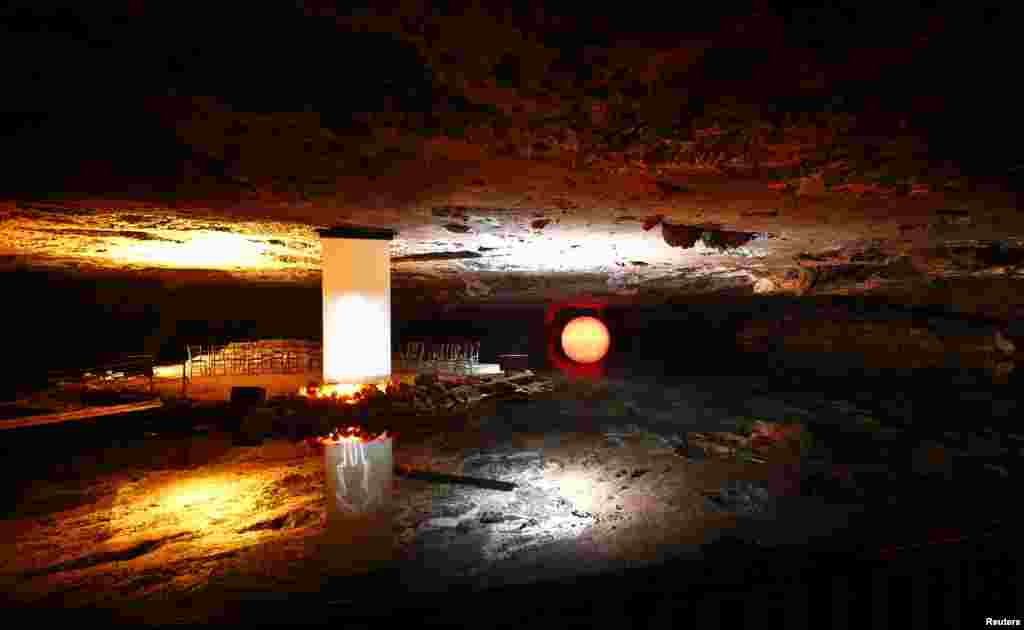 A floating stage and the vault are reflected in a salt lake of a salt mine in the southern Austrian village of Altausse. According to Altausse records, Nazis stored there more than 9000 paintings between 1943-1945.