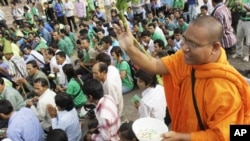 Hundreds of villagers prayed at the spirit's shrine, demanding the government to stop giving land concession to private companies in Cambodia's four provinces of Preah Vihear, Kampong Thom, Steung Treng and Kratie, file photo. 