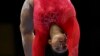 La Britannique Elissa Downie à la poutre lors des qualification pour les Championnats du monde de gymnastique à Stuttgart, Allemagne, 5 octobre 2019. (AP Photo/Matthias Schrader)