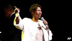 FILE - Aretha Franklin performs at the Elton John AIDS Foundation's 25th Anniversary Gala in New York, Nov. 7, 2017.