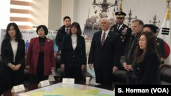 U.S. Vice President Mike Pence and his wife, Karen Pence, meet with North Korean defectors, Feb. 8, 2018, at Pyeongtaek, South Korea, at a memorial for the South Korean warship Cheonan, which was torpedoed by the North. Fred Warmbier, the father of Otto W