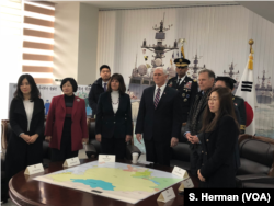 U.S. Vice President Mike Pence and his wife, Karen Pence, meet with North Korean defectors, Feb. 8, 2018, at Pyeongtaek, South Korea, at a memorial for the South Korean warship Cheonan, which was torpedoed by the North. Fred Warmbier, the father of Otto Warmbier, an American student who was jailed in North Korea and died last year after returning to the United States in a coma, second from right, will be Pence’s designated special guest at the opening ceremony.